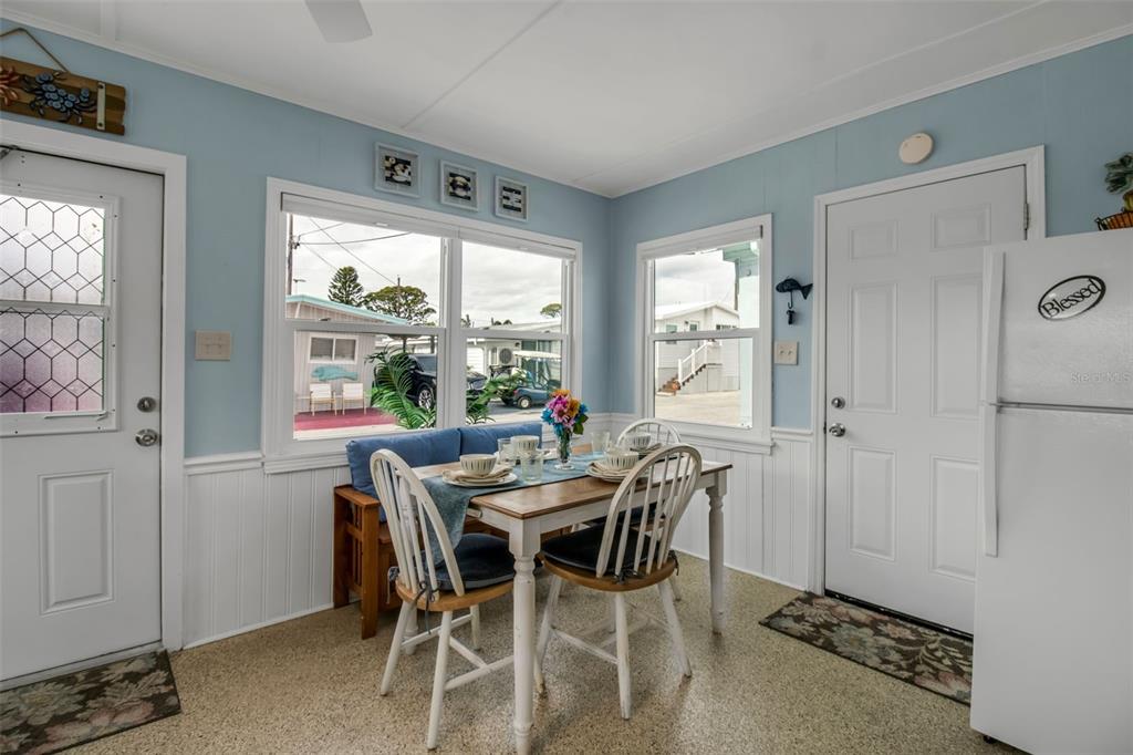 10315 Cortez Road West, Unit 123 Bradenton, FL 34210 - Photo 14 of 64 a view of a dining room with furniture window and outside view