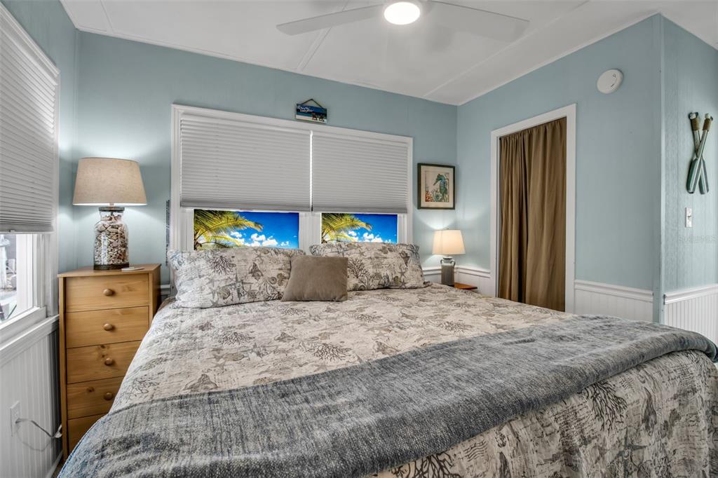 10315 Cortez Road West, Unit 123 Bradenton, FL 34210 - Photo 23 of 64 a bedroom with a large bed and a window