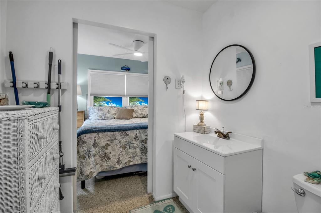 10315 Cortez Road West, Unit 123 Bradenton, FL 34210 - Photo 24 of 64 a en suite bathroom with a sink and a mirror