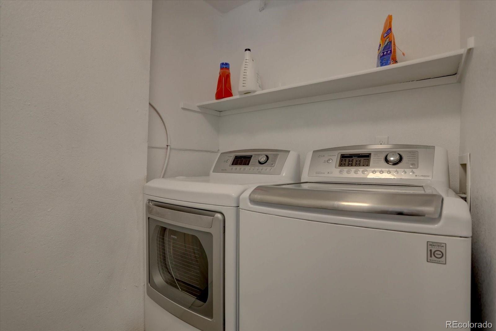 9520 Halstead Lane Lone Tree, CO 80124 - Photo 6 of 25 a utility room with dryer and washer