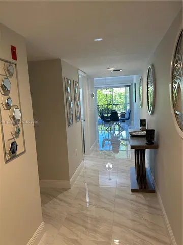 a view of a livingroom with furniture and window