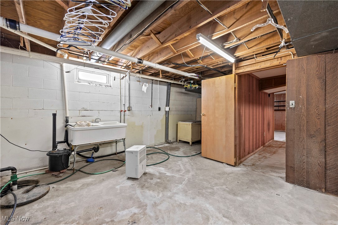 14015 West Lake Road Vermilion, OH 44089 - Photo 43 of 50 Below grade area with drainage system and a sink