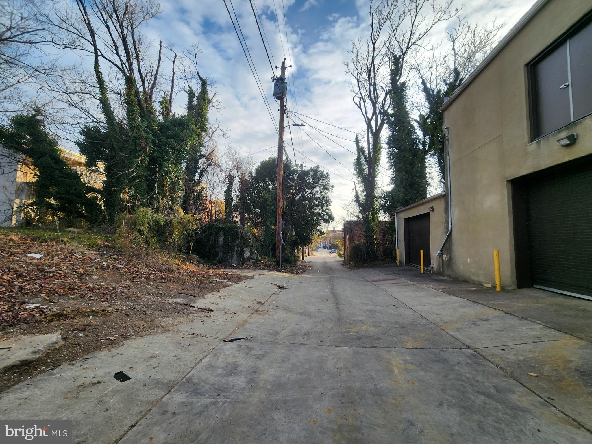 1939 Booth Street Baltimore, MD 21223 - Photo 3 of 3 a view of a house with a yard and garage