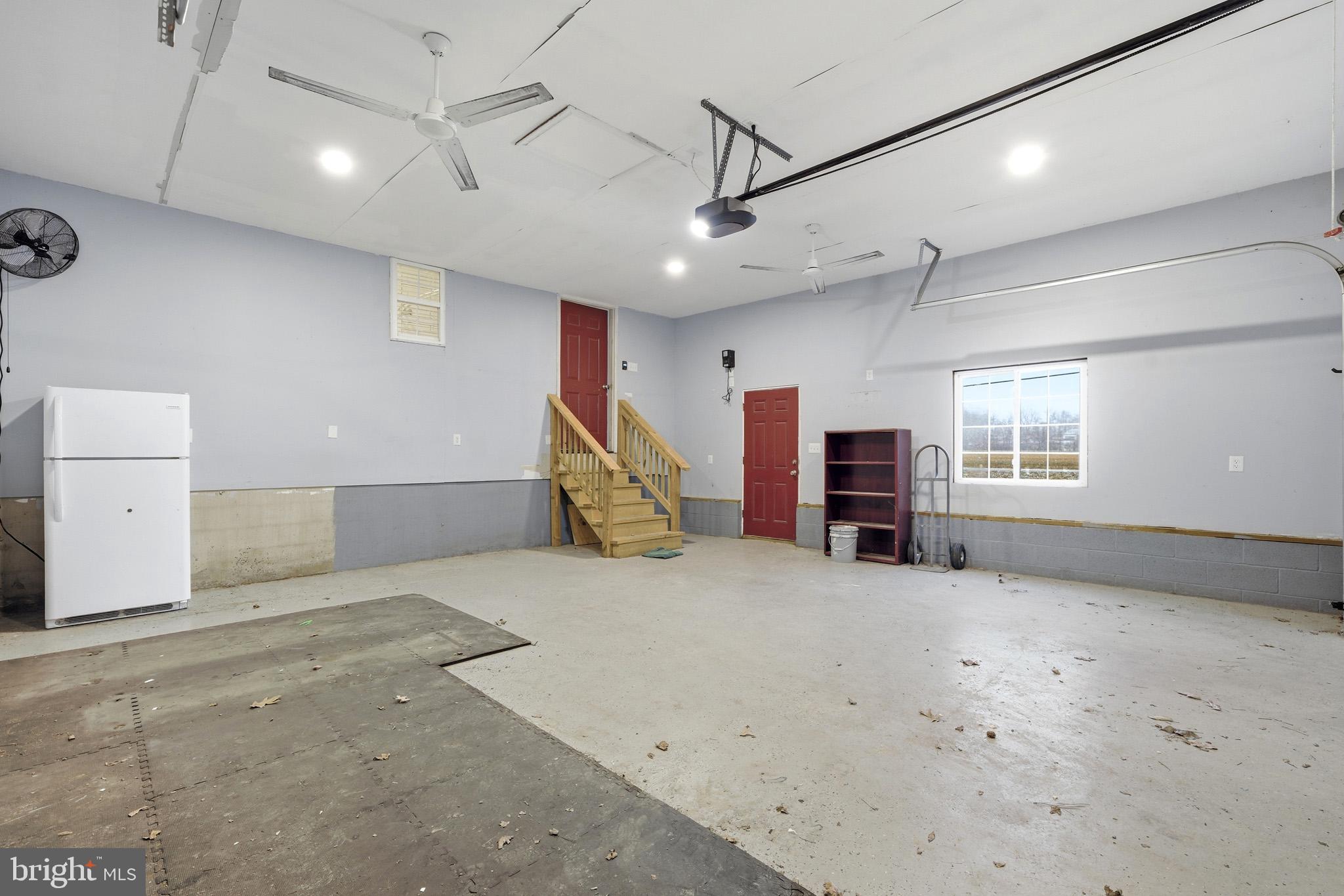 22343 Newtowne Neck Road Leonardtown, MD 20650 - Photo 38 of 40 Large garage with space for storage.