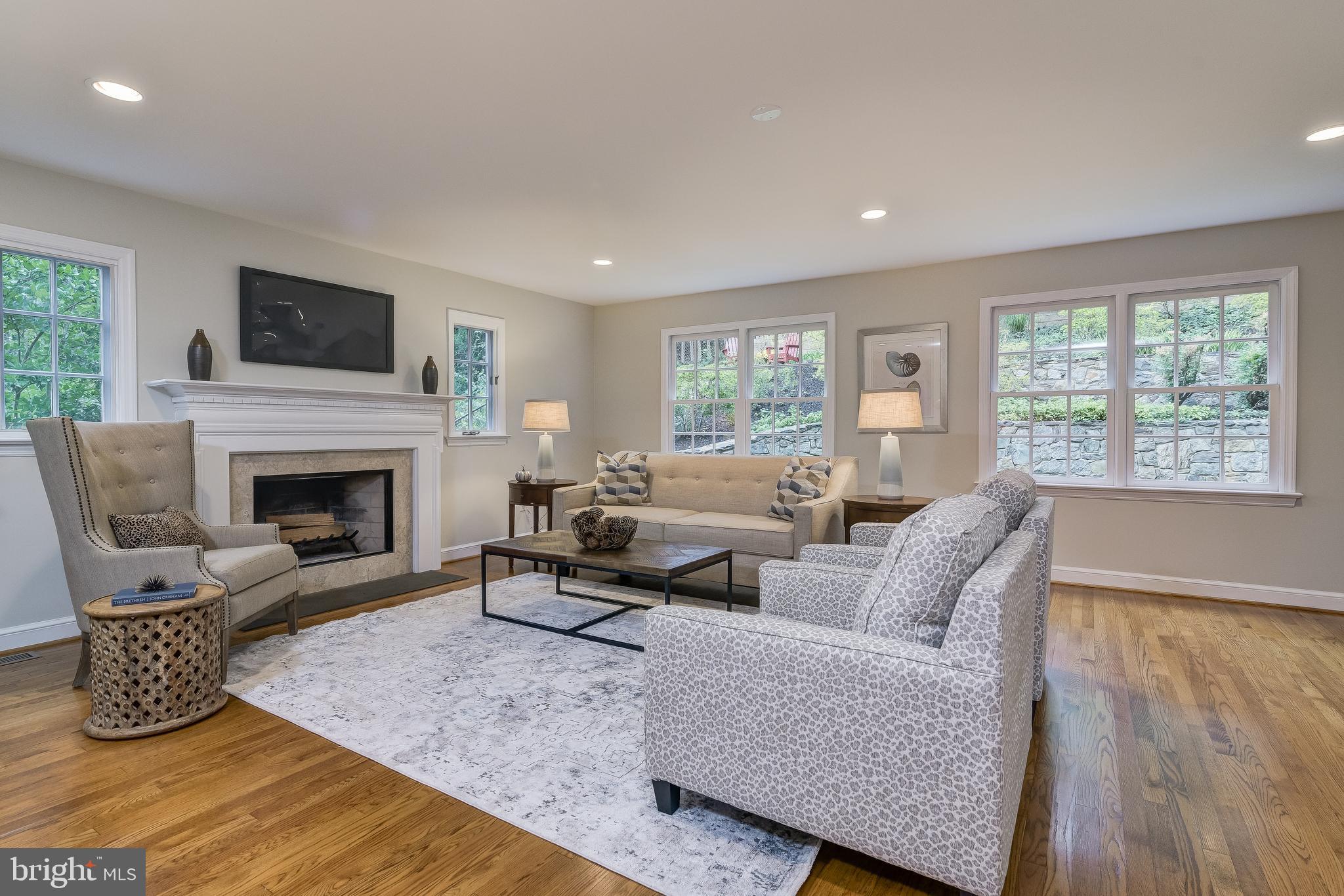 5911 Gloster Road Bethesda, MD 20816 - Photo 17 of 79 Family Room with 6 windows, bring the outside in!