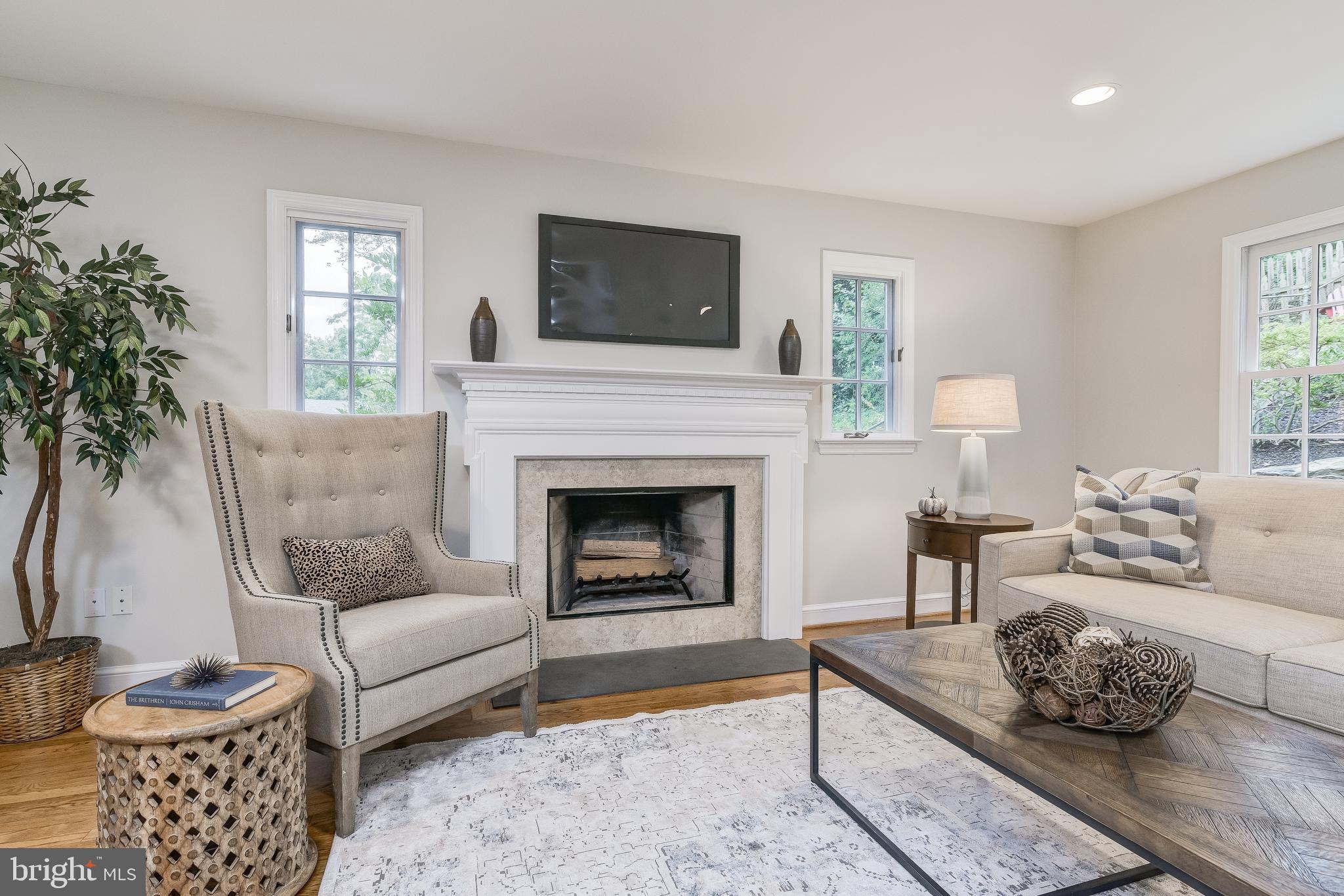 5911 Gloster Road Bethesda, MD 20816 - Photo 18 of 79 Family Room with fireplace.