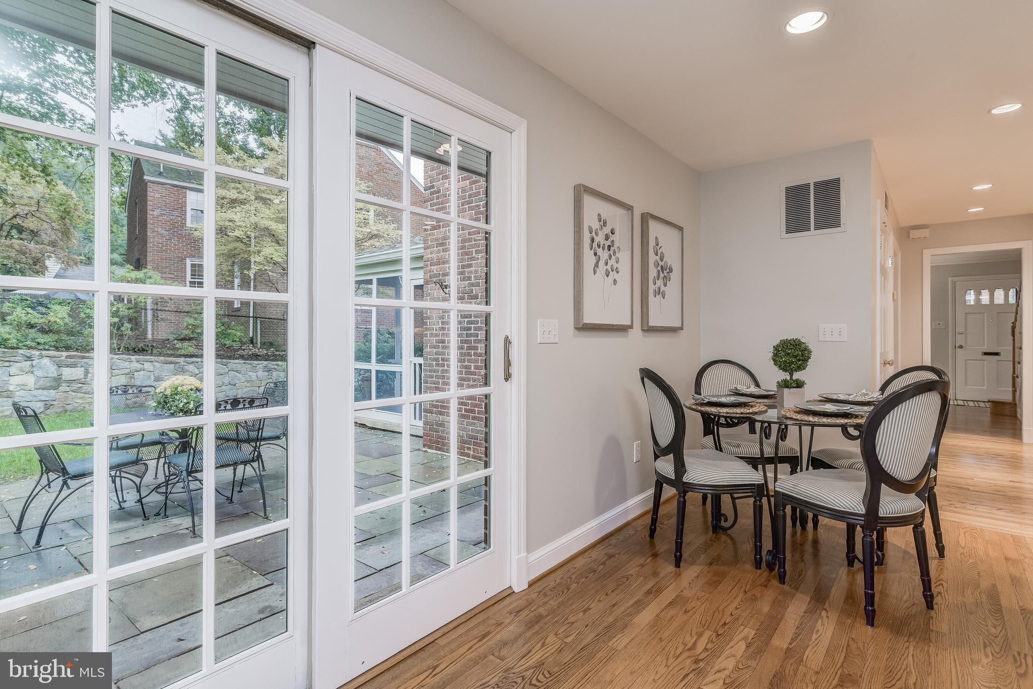 5911 Gloster Road Bethesda, MD 20816 - Photo 19 of 79 Sliding glass doors to patio.