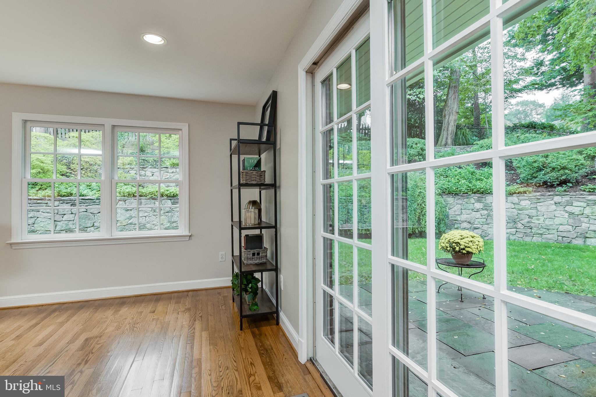 5911 Gloster Road Bethesda, MD 20816 - Photo 20 of 79 Step outside to the stone walls and beautiful yard