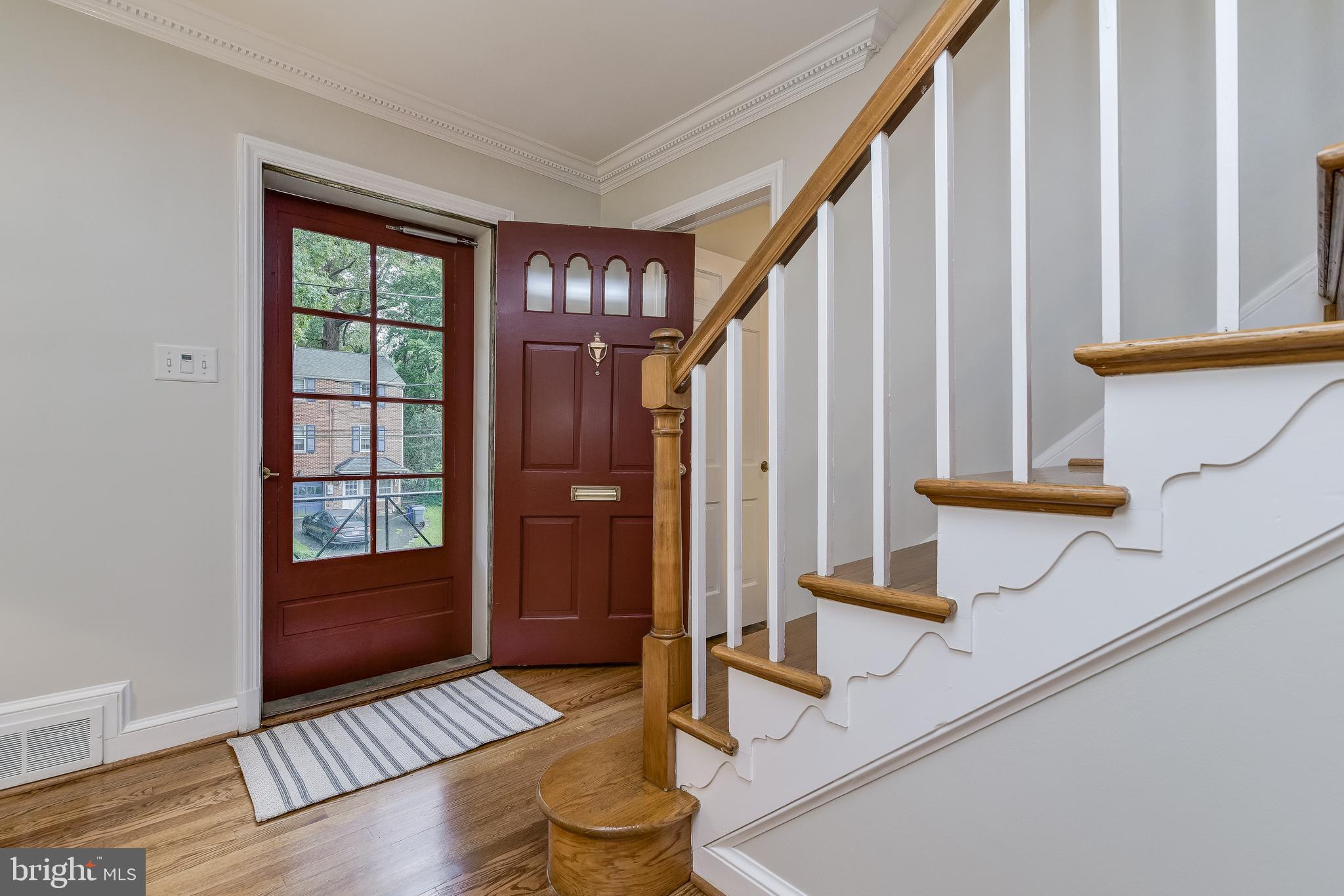 5911 Gloster Road Bethesda, MD 20816 - Photo 4 of 79 Foyer with gleaming refinished floors!