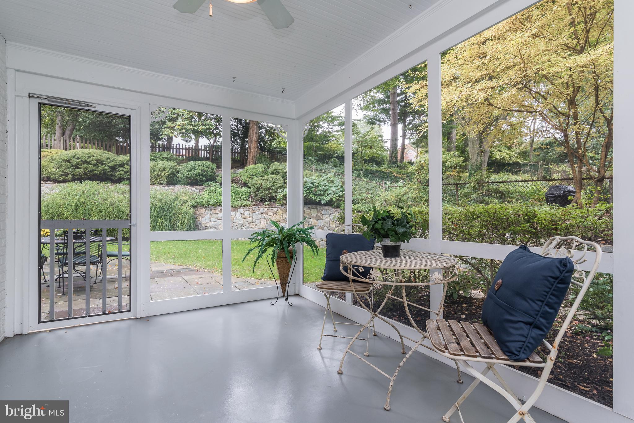 5911 Gloster Road Bethesda, MD 20816 - Photo 35 of 79 Screen Porch with views of specimen plantings.