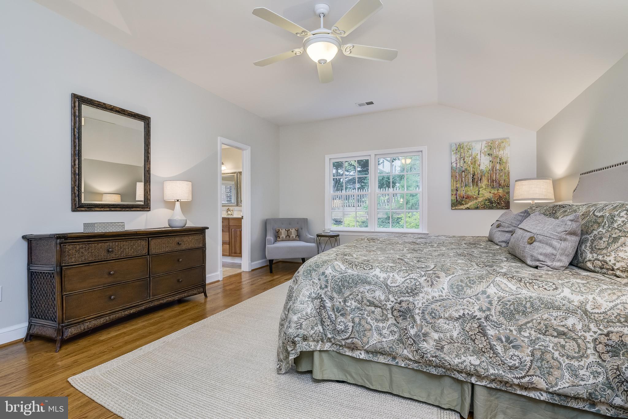 5911 Gloster Road Bethesda, MD 20816 - Photo 38 of 79 Primary Bedroom with ceiling fan, hardwood floors.