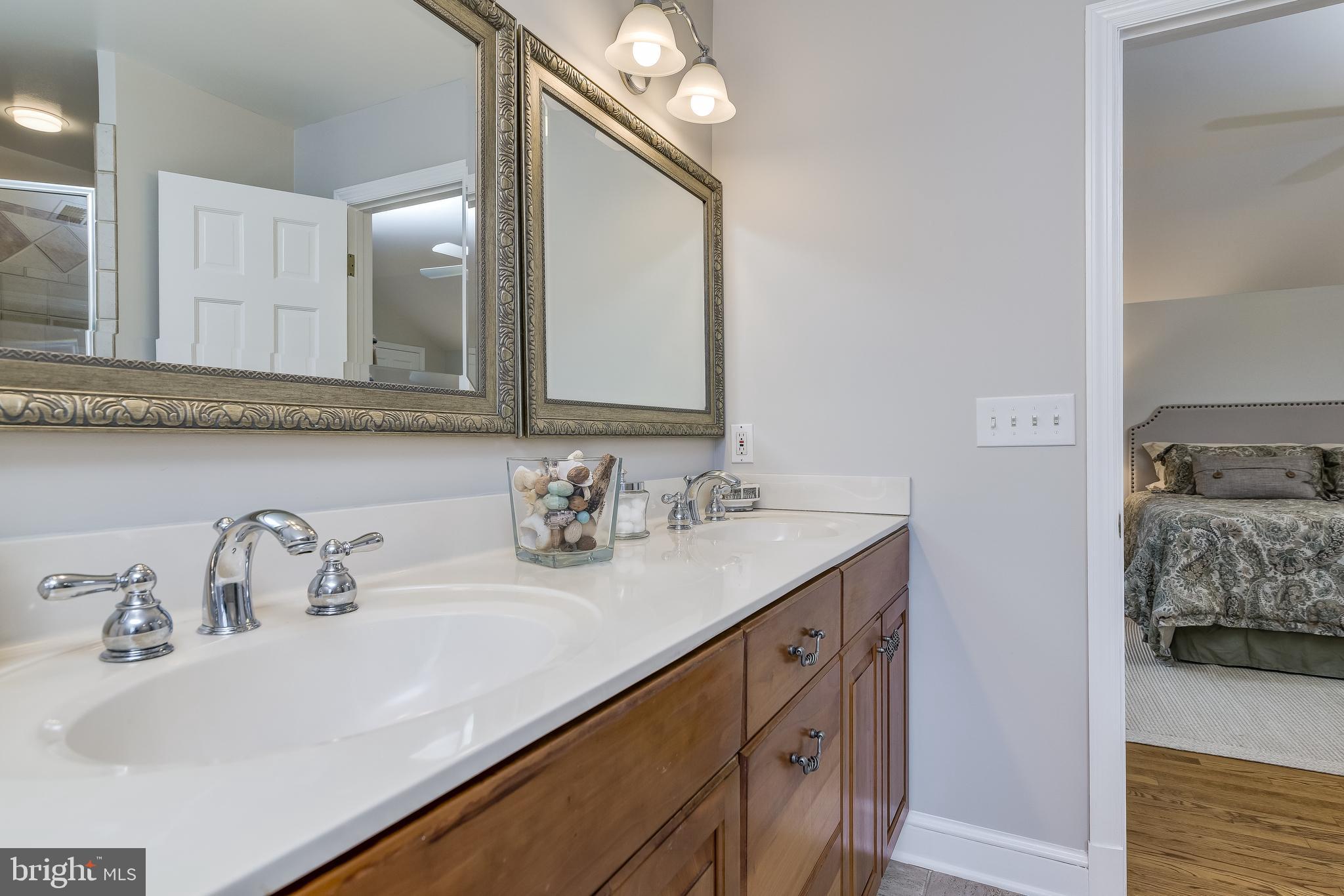 5911 Gloster Road Bethesda, MD 20816 - Photo 44 of 79 Dual vanity sinks. Spotless!
