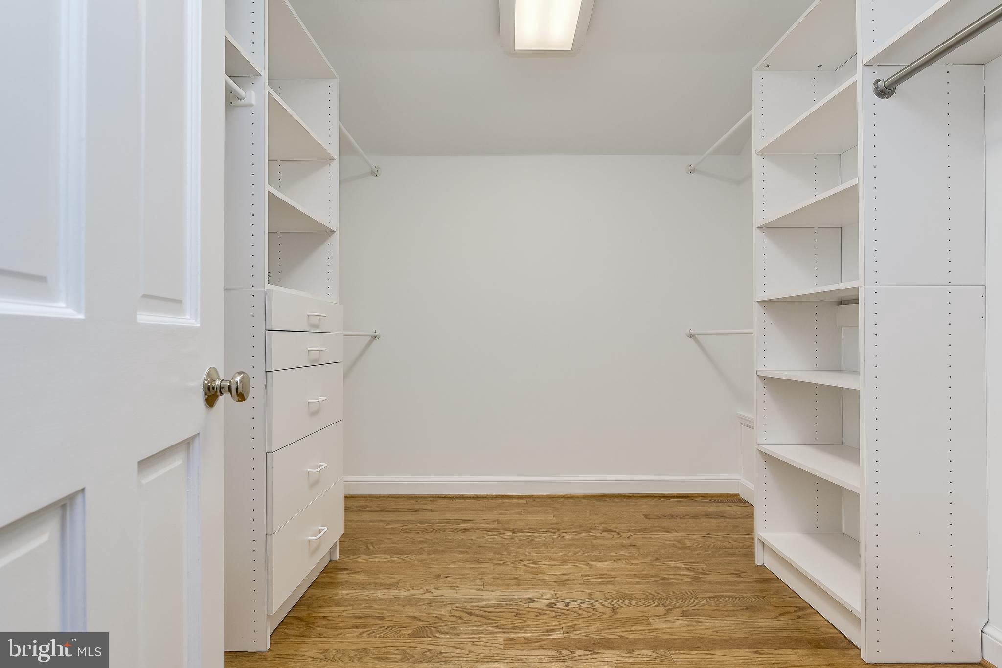 5911 Gloster Road Bethesda, MD 20816 - Photo 45 of 79 Walk-in closet! Built-ins, drawers, hanging bars!