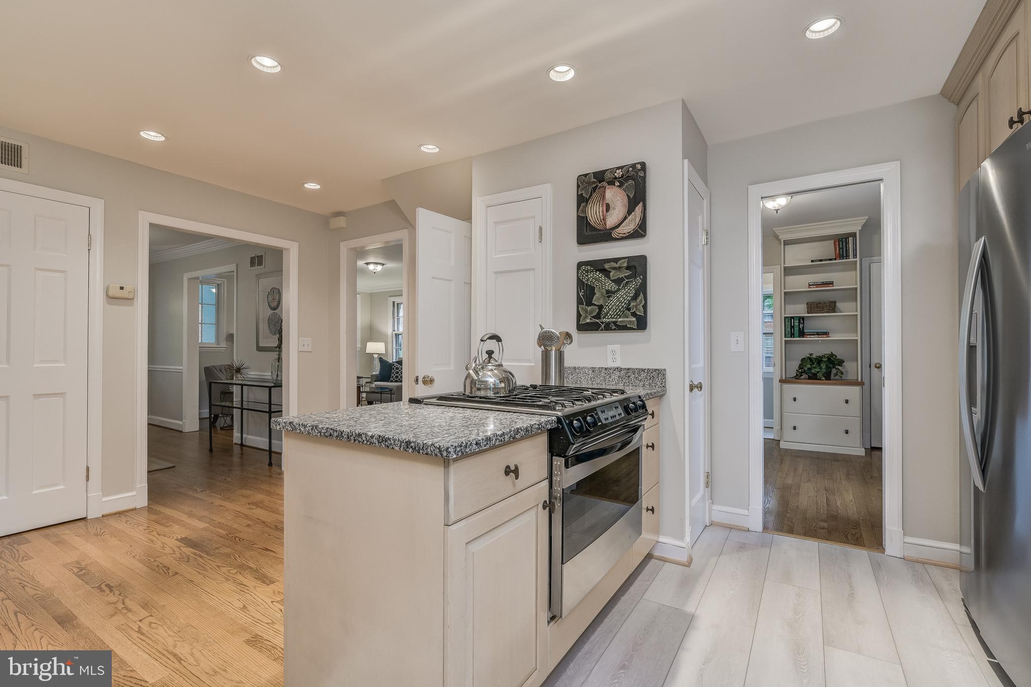 5911 Gloster Road Bethesda, MD 20816 - Photo 8 of 79 Kitchen with new LVP floor & recessed lighting.