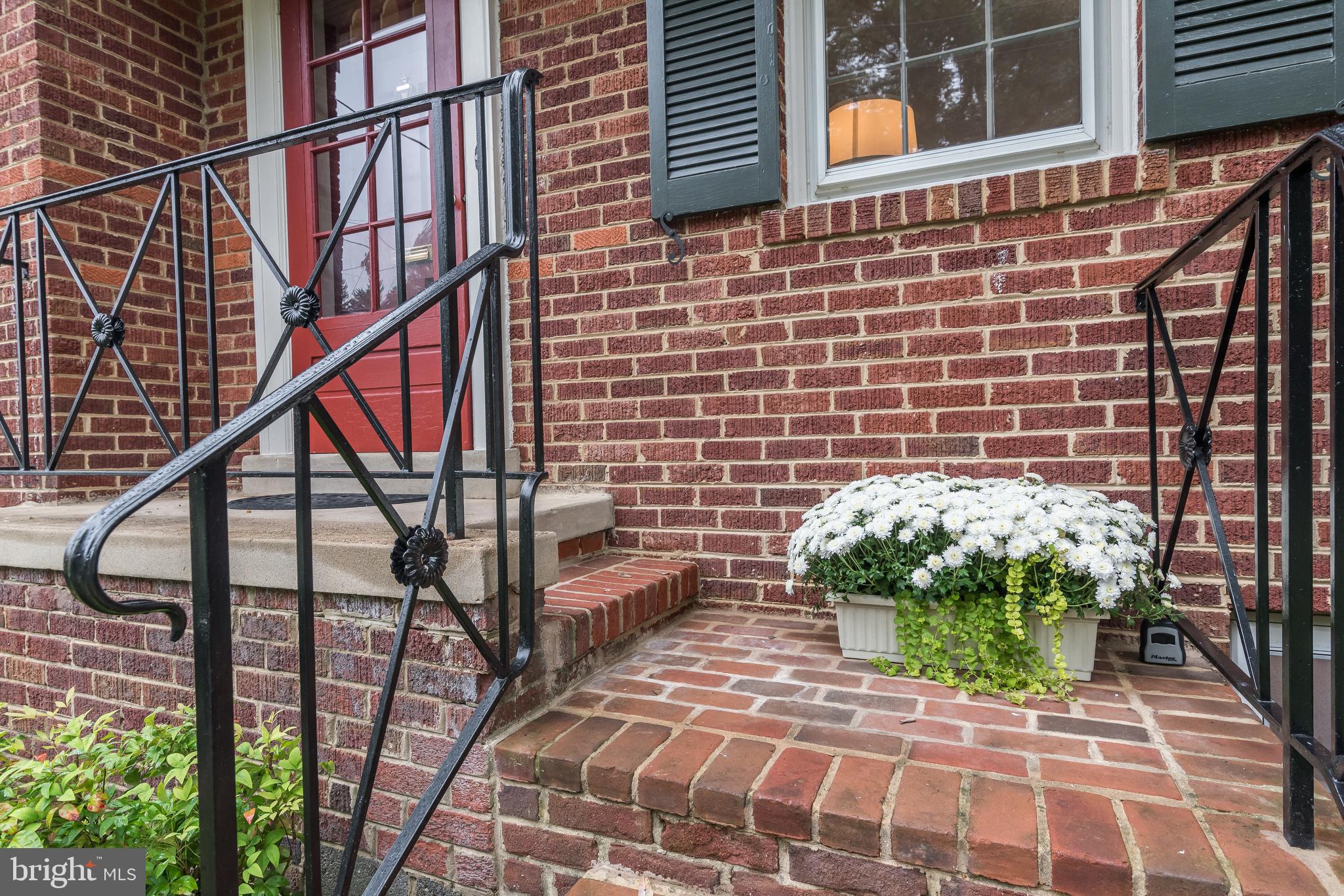 5911 Gloster Road Bethesda, MD 20816 - Photo 72 of 79 Front porch, sturdy iron railings.