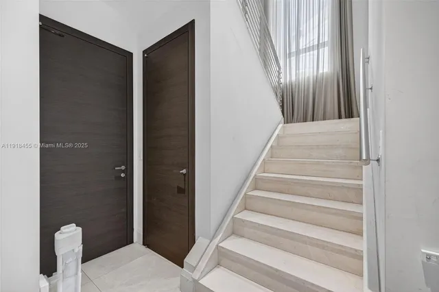 a view of a bathroom from the hallway