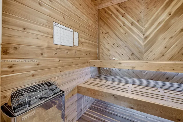 a view of a house with a flower garden