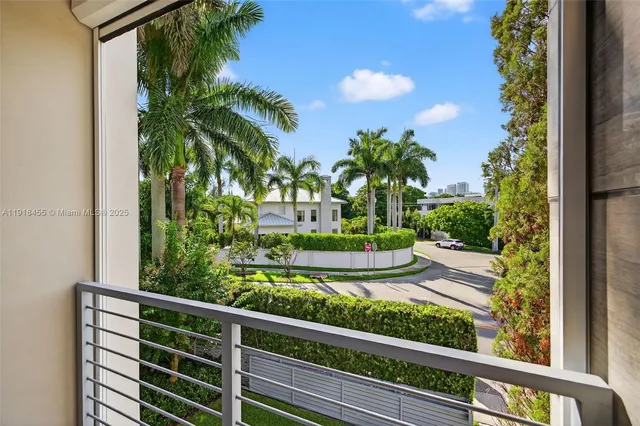 a bathroom with a sink toilet a mirror and shower