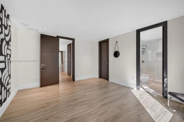 a view of a balcony with wooden floor