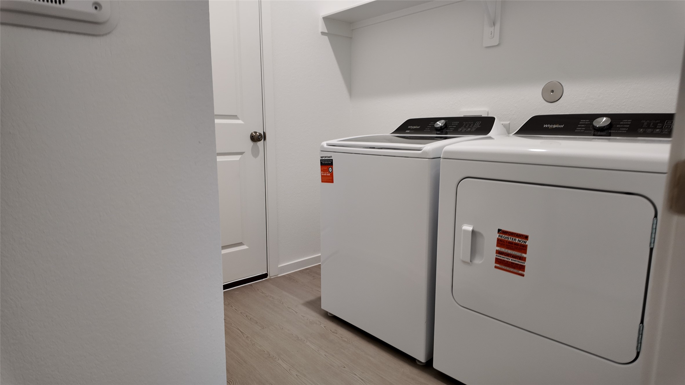 15023 Rustic Moon Road Conroe, TX 77302 - Photo 9 of 18 a utility room with dryer and washer