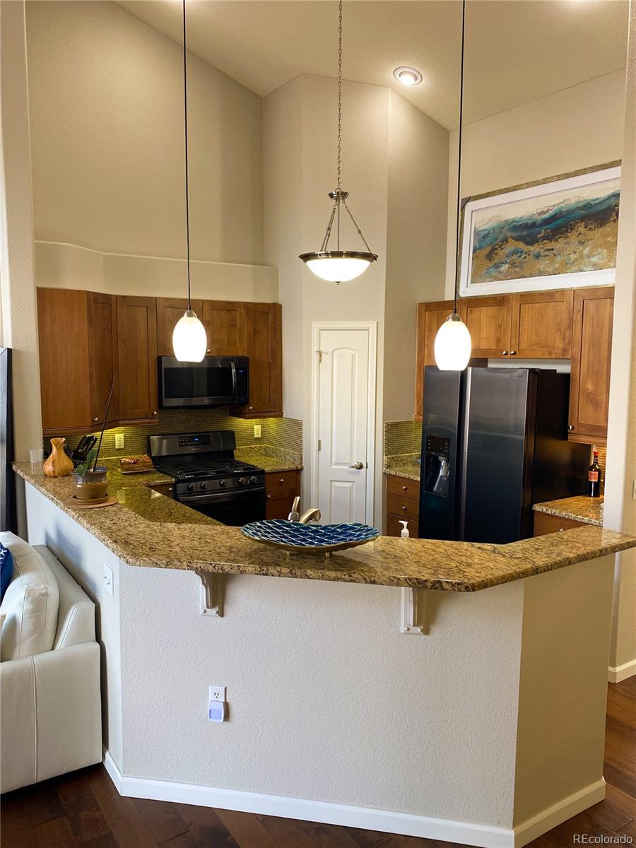 8649 Gold Peak Drive, Unit B Highlands Ranch, CO 80130 - Photo 5 of 31