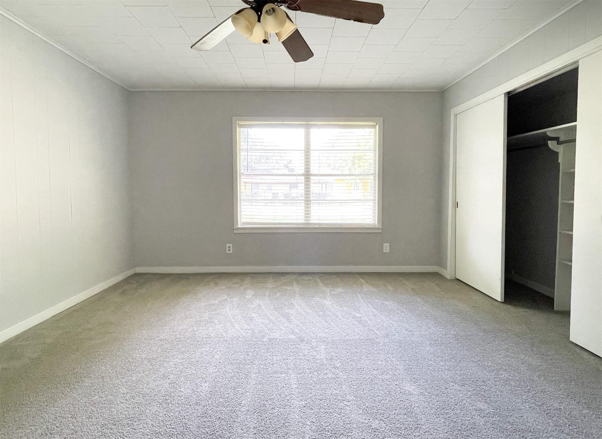 409 Koehl Street Wharton, TX 77488 - Photo 11 of 17 an empty room with a window