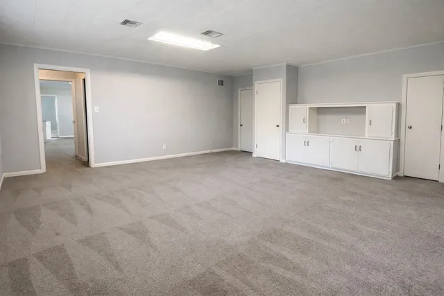 an aerial view of houses with outdoor space