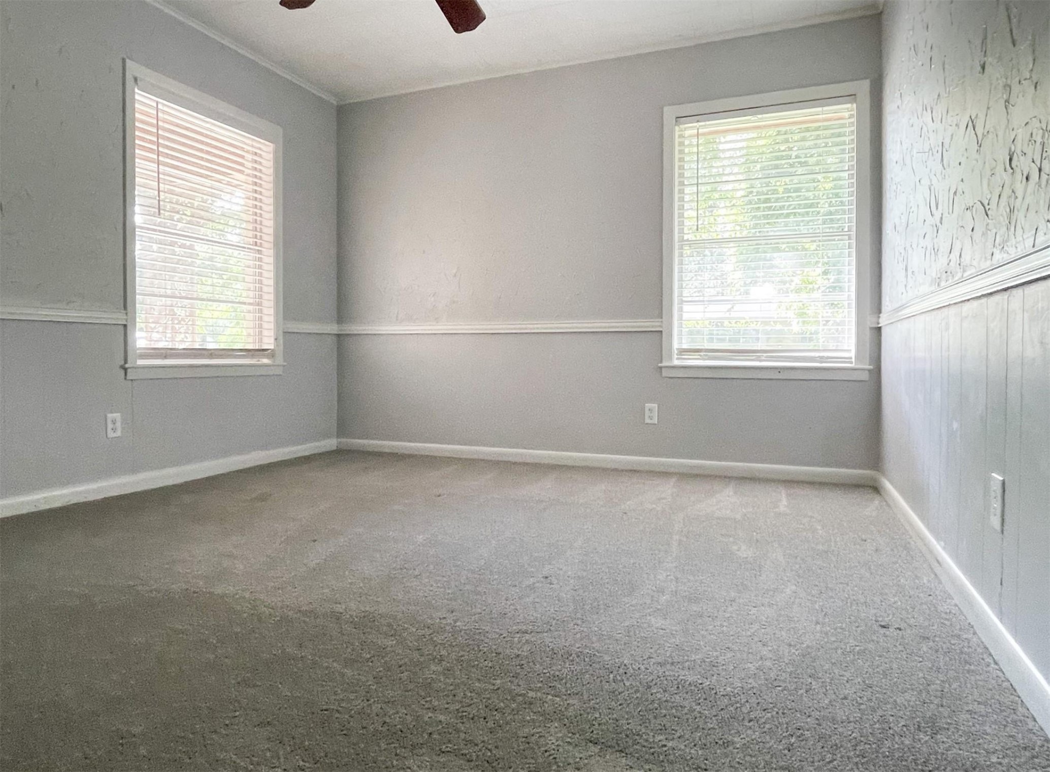 409 Koehl Street Wharton, TX 77488 - Photo 13 of 17 an empty room with a window