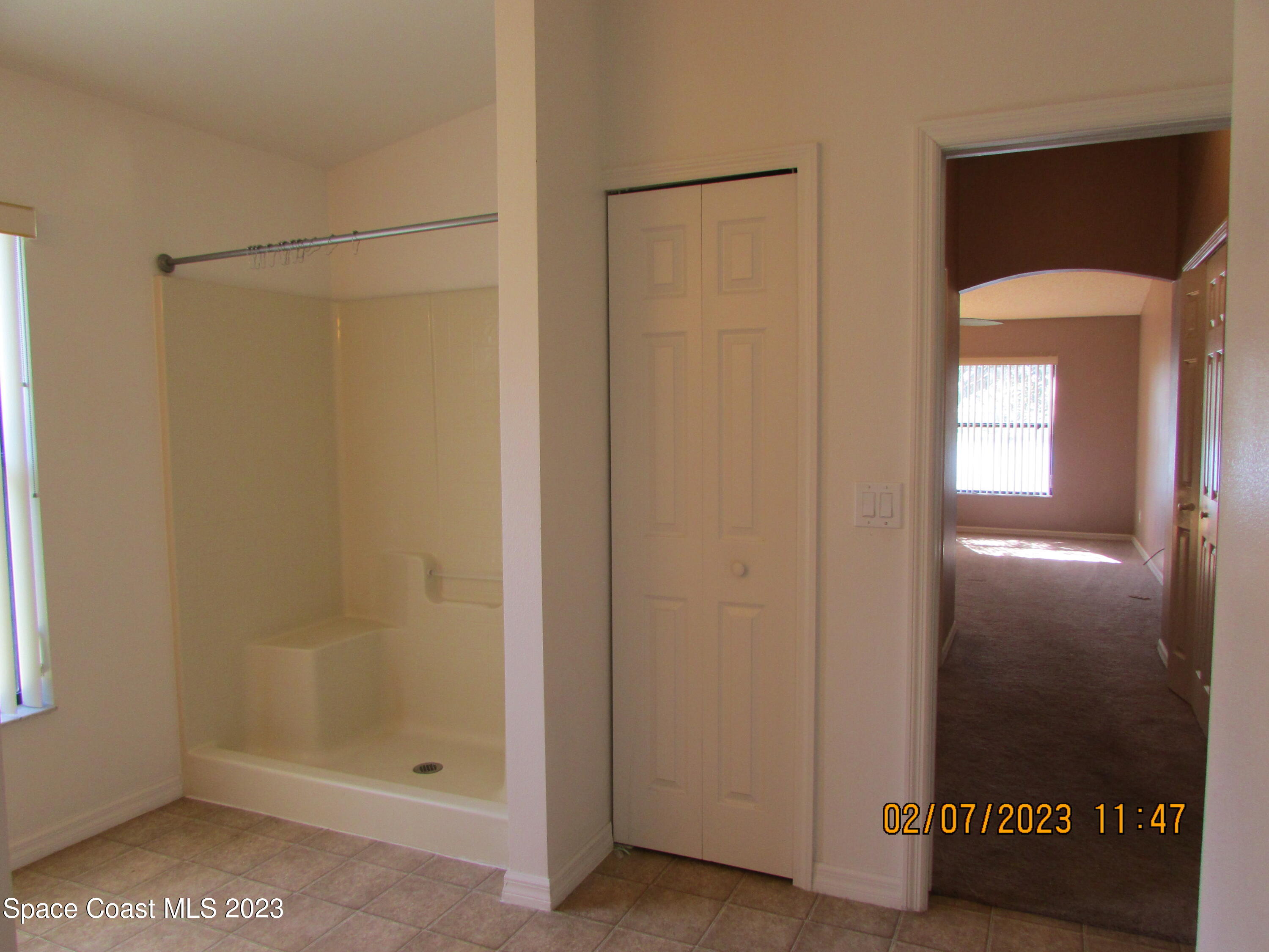 4001 Wilkes Drive Melbourne, FL 32901 - Photo 16 of 21 a bathroom with a shower