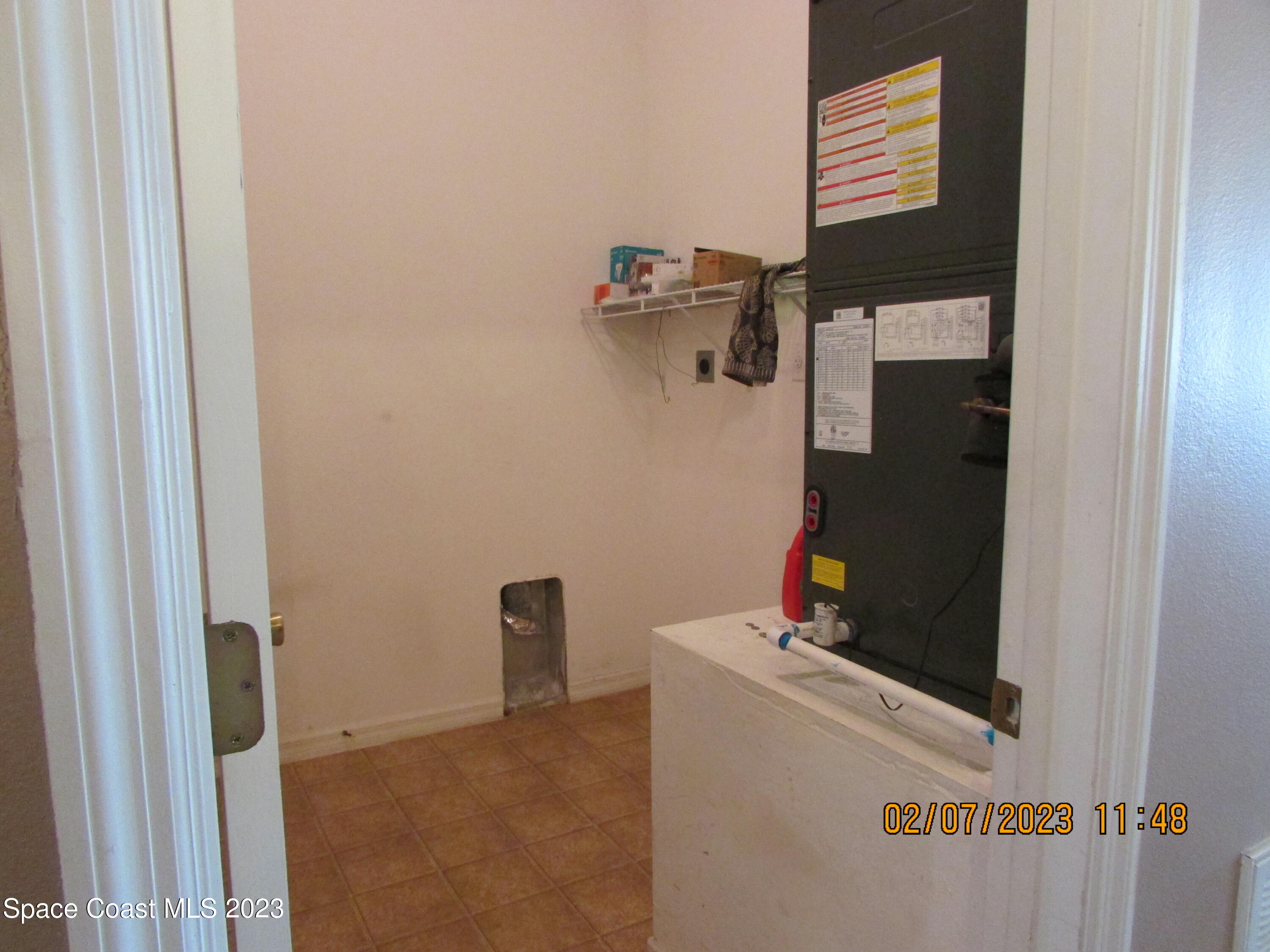4001 Wilkes Drive Melbourne, FL 32901 - Photo 18 of 21 a utility room with dryer and washer