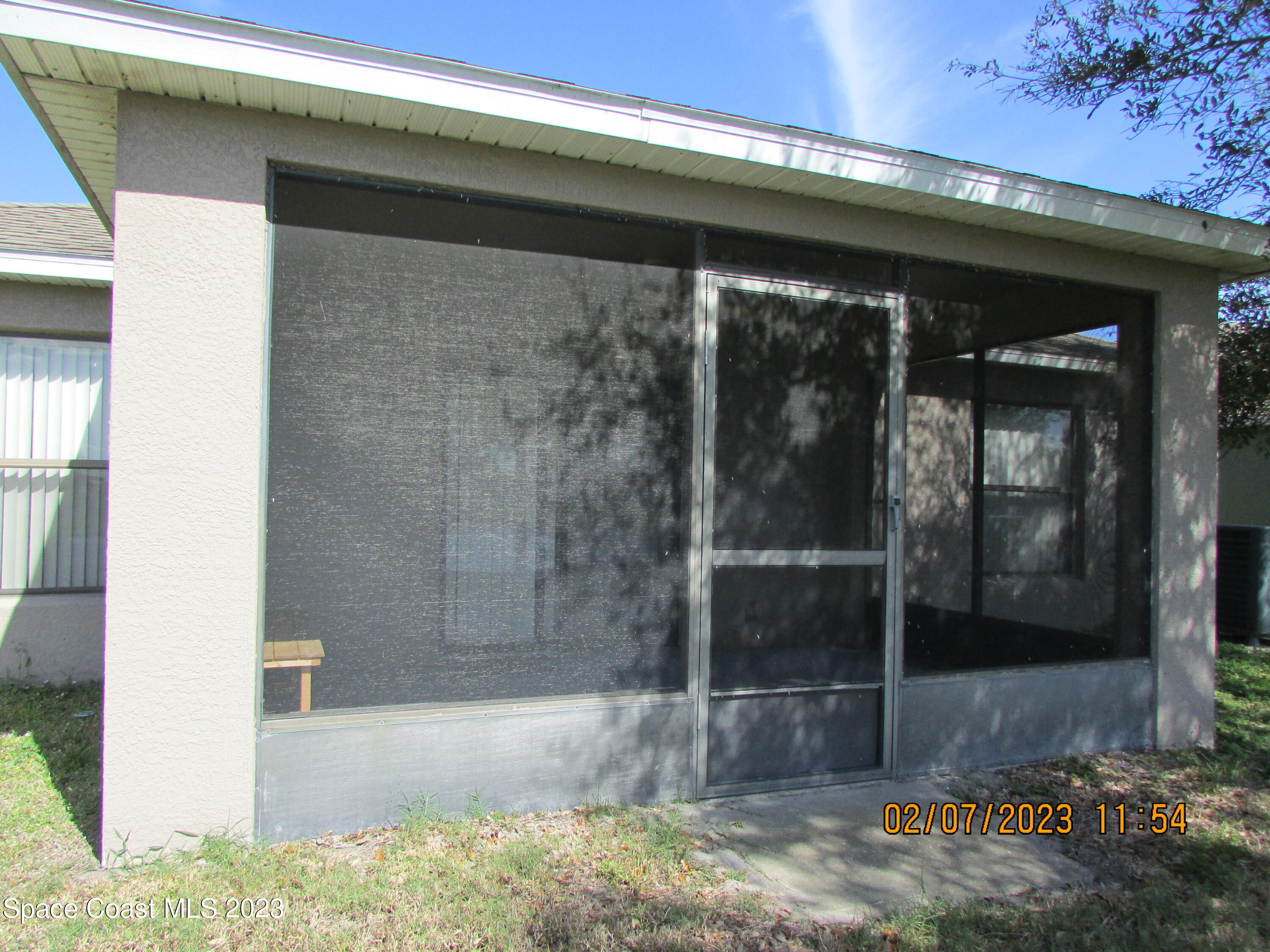 4001 Wilkes Drive Melbourne, FL 32901 - Photo 19 of 21 a view of a glass door