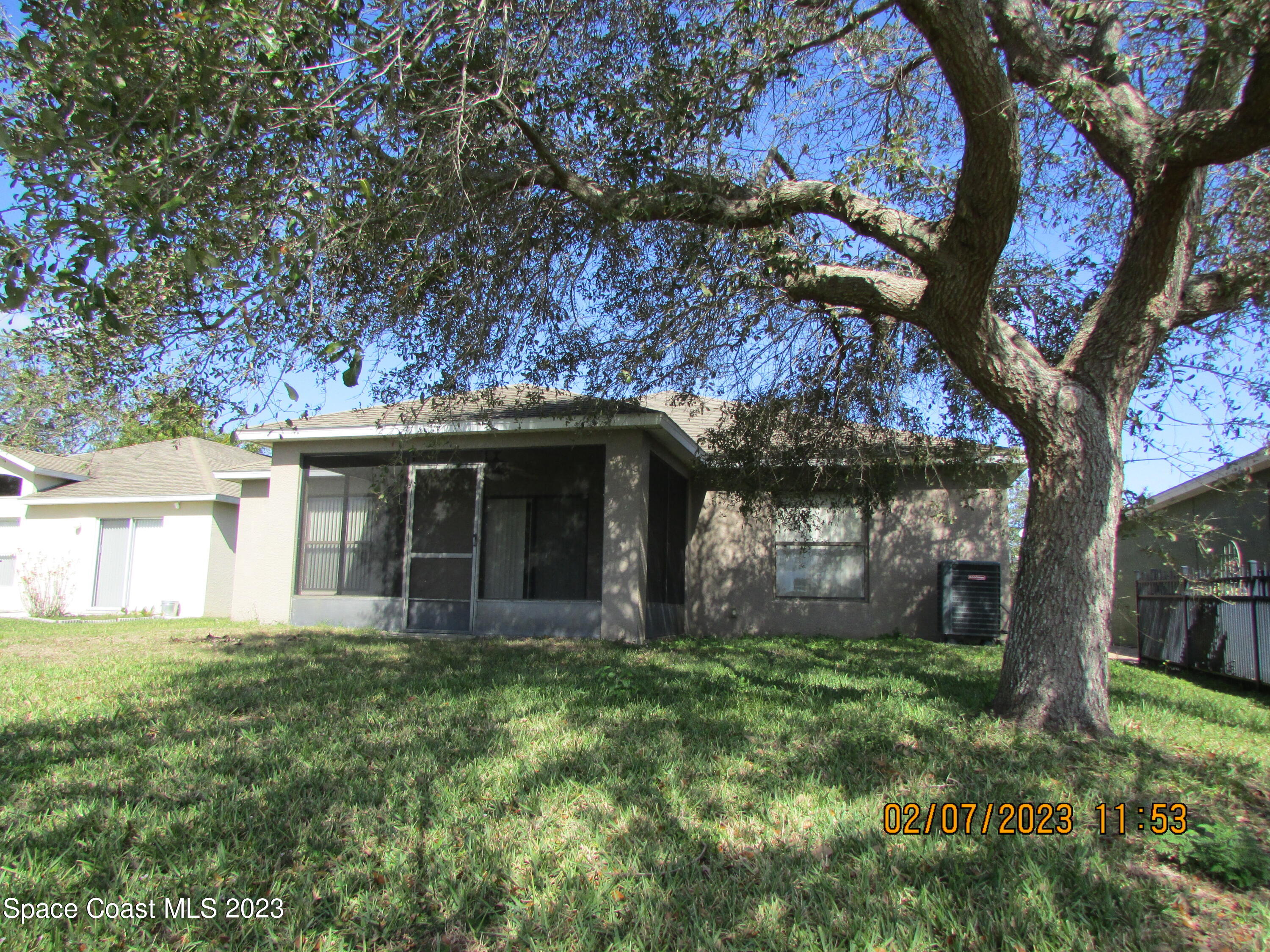 4001 Wilkes Drive Melbourne, FL 32901 - Photo 20 of 21 front view of a house with a yard