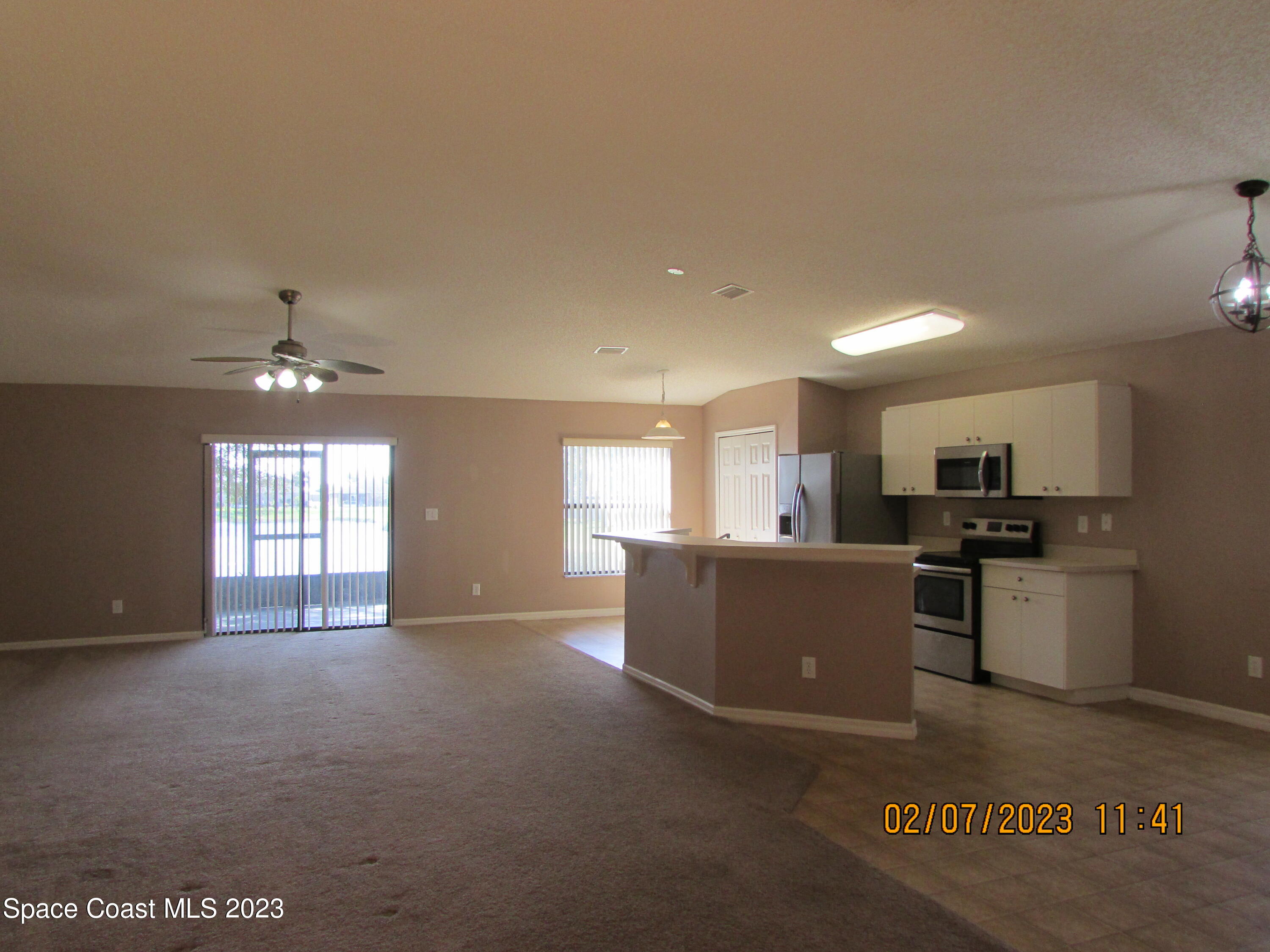 4001 Wilkes Drive Melbourne, FL 32901 - Photo 6 of 21 a view of kitchen with furniture and window