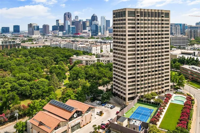 a view of a city with tall buildings