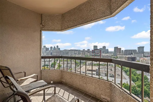 a view of a city from a balcony