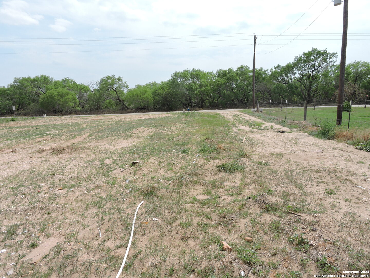 5968 Tabberer Road Poteet, TX 78065 - Photo 6 of 7 a view of a backyard