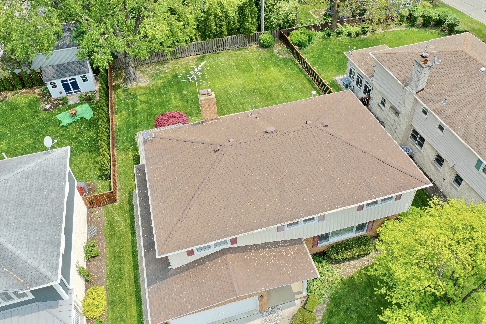 123 South Ridge Avenue Arlington Heights, IL 60005 - Photo 33 of 37 an aerial view of a house with a yard and outdoor seating