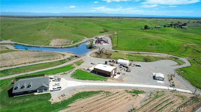 an aerial view of a house with a garden