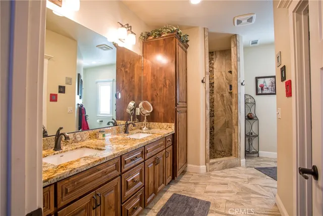 a kitchen with a sink cabinets and appliances