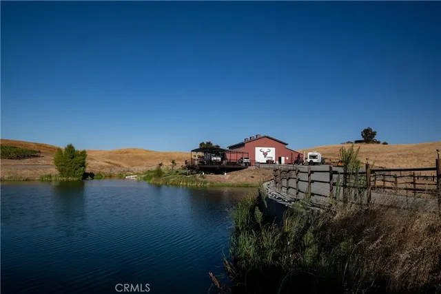 a view of a car park in front of a house