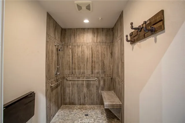 a close up of air conditioner duct and water view