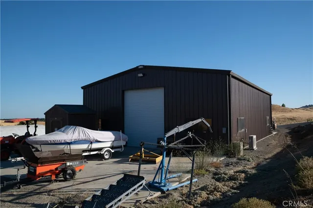 a view of a yard with an outdoor space