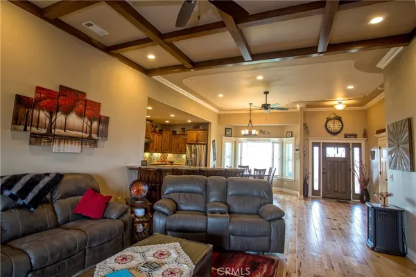 a view of a livingroom with furniture and windows
