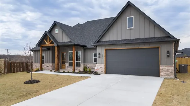 a front view of a house with yard