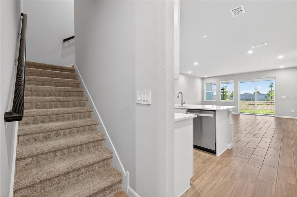 8822 Ginko Run Parrish, FL 34219 - Photo 16 of 30 a view of kitchen with sink and refrigerator