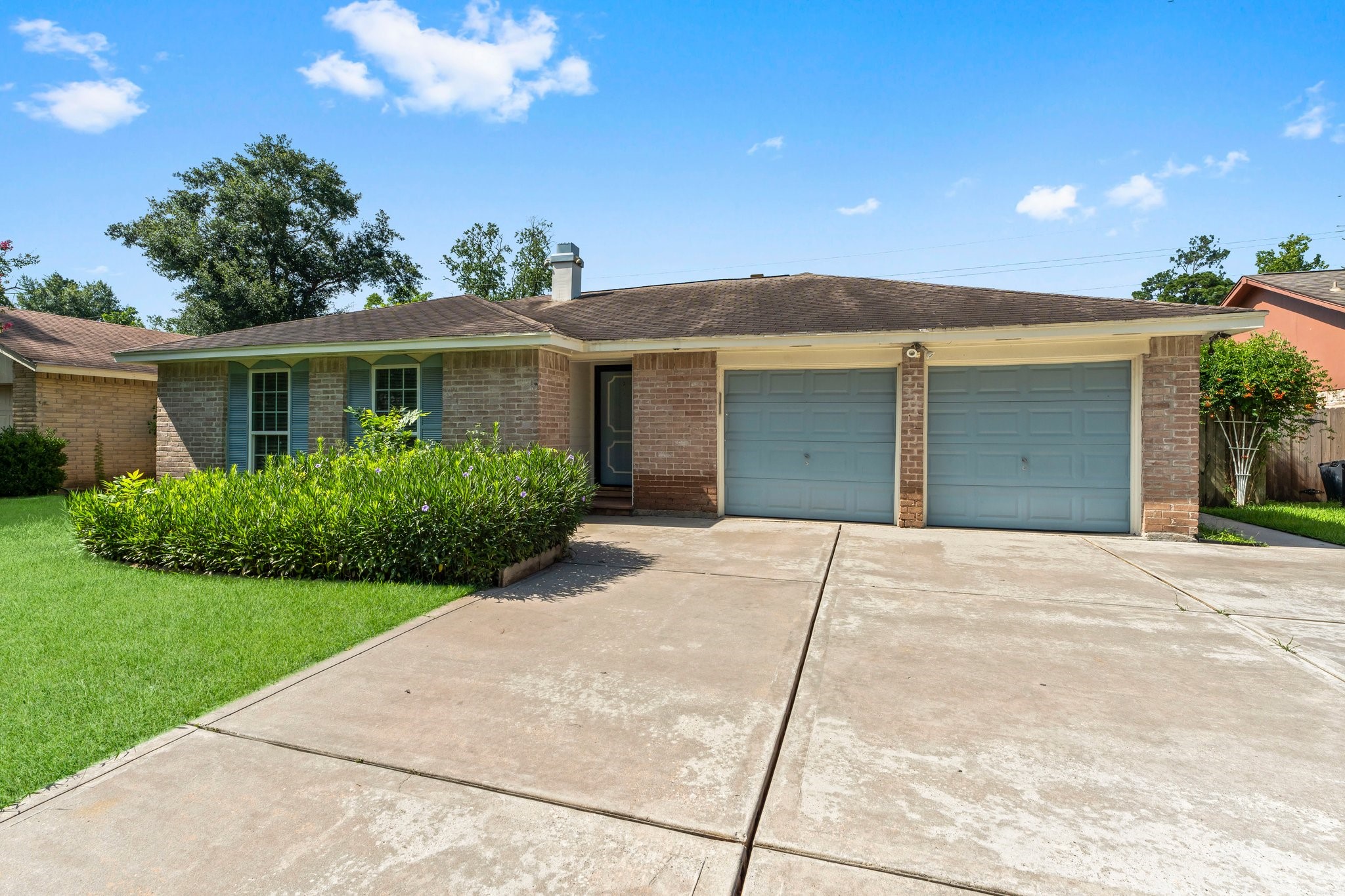 3527 Acorn Way Lane Spring, TX 77389 - Photo 1 of 26 a front view of a house with a yard and garage