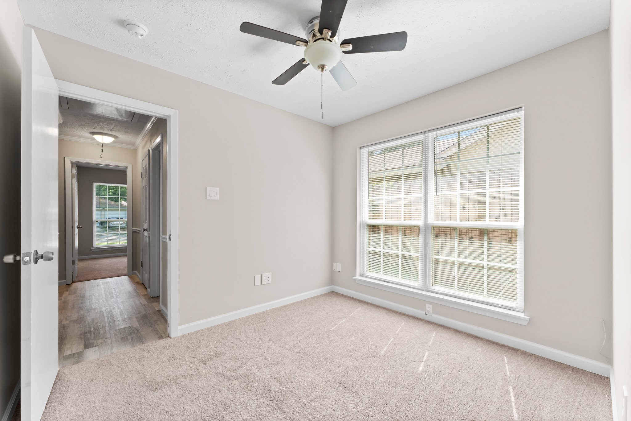 3527 Acorn Way Lane Spring, TX 77389 - Photo 14 of 26 an empty room with fan and windows