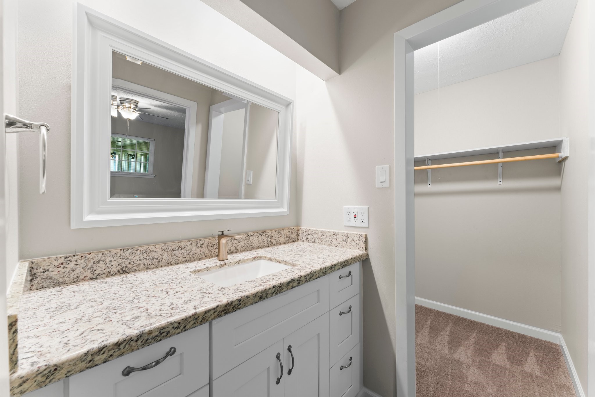 3527 Acorn Way Lane Spring, TX 77389 - Photo 17 of 26 a bathroom with a granite countertop sink and a mirror