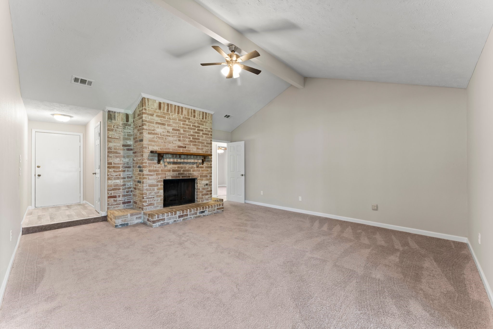 3527 Acorn Way Lane Spring, TX 77389 - Photo 4 of 26 a view of an empty room with a fireplace