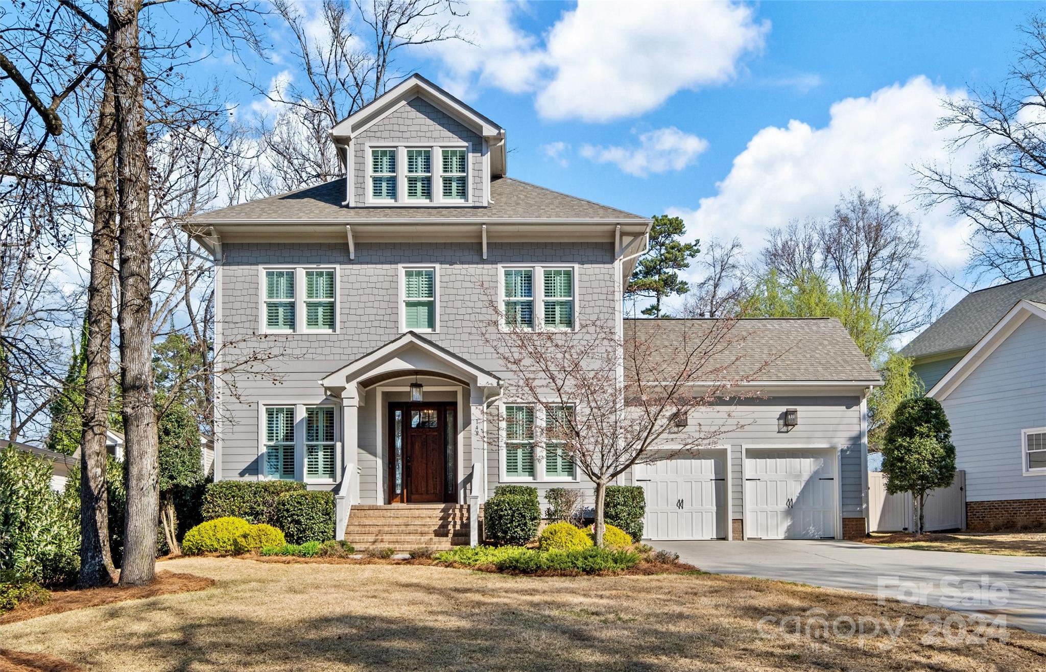 149 McAlway Road Charlotte, NC 28211 - Photo 1 of 48 a front view of a house with a yard